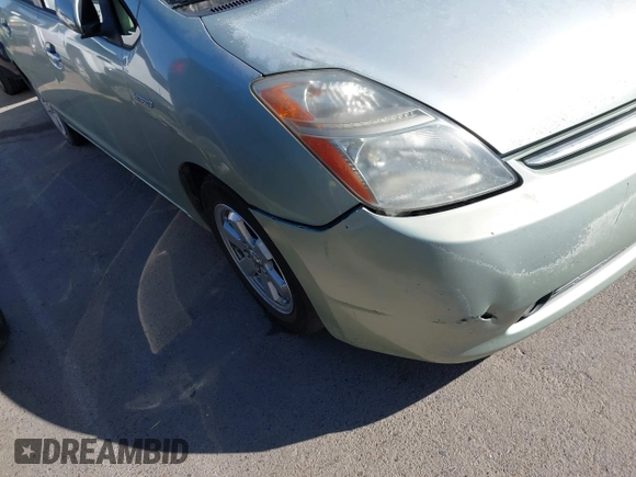 2007 Toyota Prius z VIN JTDKB20U973221624, wystawiony jako IAAI lot #42484947 z przebiegiem 257 311 mil mil oraz . Historia ofert i sprzedaży dostępna na DreamBid. Obrazek 15.