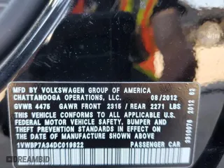 2013 Volkswagen Passat SE with VIN 1VWBP7A34DC019822, listed as a Copart auction lot 54716514 with 113,894 mi miles and Salvage Title. Bid and sale history available at carsss.com. Image 12.