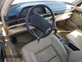 1989 Mercedes-Benz 560 with VIN WDBCA39E8KA469603, listed as a Copart auction lot 82986634 with 81,490 mi miles and Clean Title. Bid and sale history available at DreamBid. Image 8.