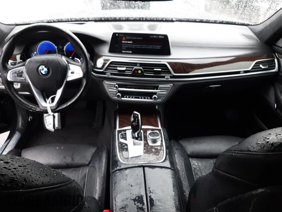 2016 BMW 7 Series 750i xDrive with VIN WBA7F2C58GG416876, listed as a Copart auction lot 37267523 with 77,741 mi miles. Bid and sale history available at carsss.com. Image 8.