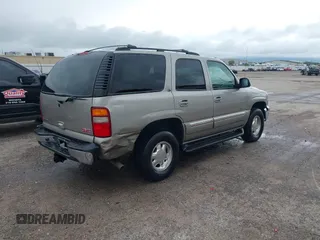 2003 GMC Yukon SLT z VIN 1GKEC13Z03R314068, wystawiony jako IAAI lot #42132464 z przebiegiem 214 826 mil mil oraz . Historia ofert i sprzedaży dostępna na DreamBid. Obrazek 4.