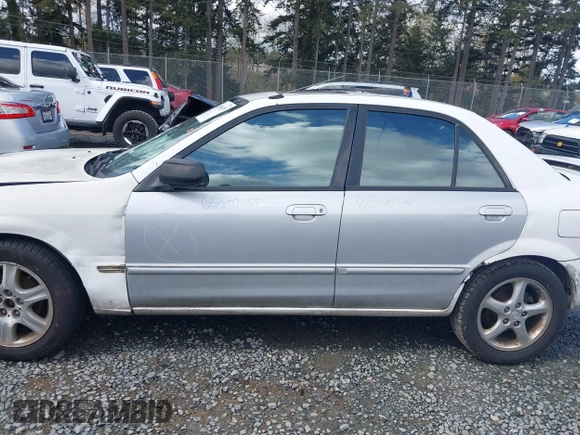 2002 Mazda Protege DX with VIN JM1BJ225520542854, listed as a IAAI auction lot 41955679 with 161,338 mi miles and . Bid and sale history available at DreamBid. Image 14.