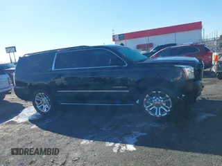 2016 GMC Yukon XL SLT with VIN 1GKS2GKC0GR443634, listed as a IAAI auction lot 41379064 with 121,744 mi miles. Bid and sale history available at carsss.com. Image 13.
