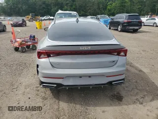 2022 Kia K5 GT-Line z VIN 5XXG64J2XNG149610, wystawiony jako Copart lot #55333245 z przebiegiem Nie podano mil oraz Szkoda całkowita • Salvage title. Historia ofert i sprzedaży dostępna na DreamBid. Obrazek 6.
