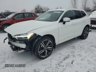 2018 Volvo XC60 R-Design z VIN YV4A22RM0J1003828, wystawiony jako Copart lot #86587754 z przebiegiem 105 358 mil mil oraz Czysty tytuł • Clean title. Historia ofert i sprzedaży dostępna na DreamBid. Obrazek 1.