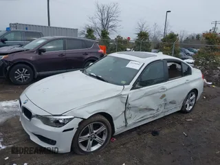 2013 BMW 3 Series 328i with VIN WBA3C1G57DNR49126, listed as a IAAI auction lot 41334342 with 164,710 mi miles and . Bid and sale history available at DreamBid. Image 2.