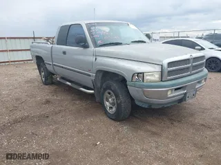 1999 Dodge Ram 1500 with VIN 3B7HF13Z8XG140644, listed as a IAAI auction lot 41971280 with 157,584 mi miles. Bid and sale history available at carsss.com. Image 1.