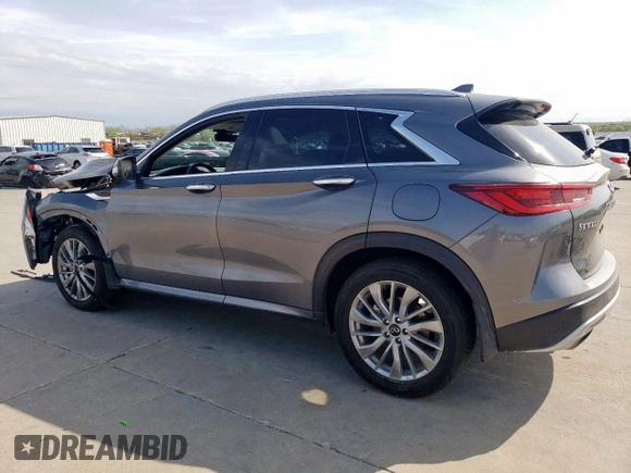 2023 Infiniti QX50 Luxe with VIN 3PCAJ5BA3PF105275, listed as a Copart auction lot 50584265 with 26,399 mi miles and Salvage title. Bid and sale history available at DreamBid. Image 2.