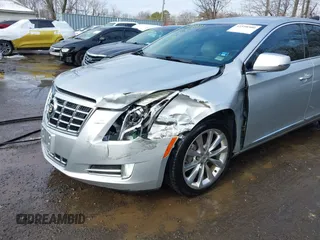 2013 Cadillac XTS Premium with VIN 2G61S5S36D9111444, listed as a IAAI auction lot 41558500 with 101,223 mi miles. Bid and sale history available at carsss.com. Image 6.