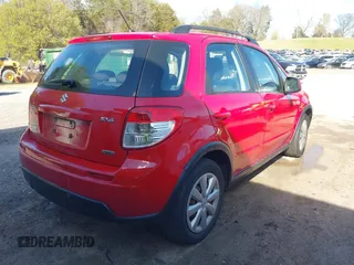2010 Suzuki SX4 with VIN JS2YB5A34A6301801, listed as a IAAI auction lot 41884838 with 124,381 mi miles. Bid and sale history available at carsss.com. Image 4.