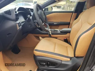 2023 Lexus RZ 450e Premium z VIN JTJAAAAB8PA020411, wystawiony jako Copart lot #58023424 z przebiegiem 1274 mil mil oraz Szkody całkowita. Historia ofert i sprzedaży dostępna na DreamBid. Obrazek 7.