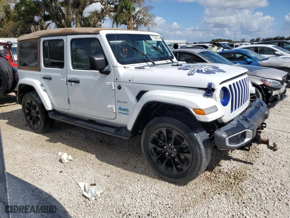 2021 Jeep Wrangler 4xe Unlimited Sahara with VIN 1C4JJXP62MW677073, listed as a Copart auction lot 77494174 with 0 mi miles and Salvage Title. Bid and sale history available at carsss.com. Image 4.