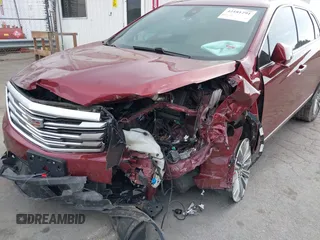 2017 Cadillac XT5 Luxury FWD z VIN 1GYKNBRS1HZ200882, wystawiony jako IAAI lot #42181291 z przebiegiem 95 687 mil mil oraz . Historia ofert i sprzedaży dostępna na DreamBid. Obrazek 6.