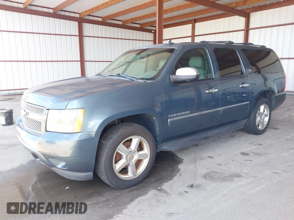2009 Chevrolet Suburban LTZ with VIN 1GNFC36J29R293712, listed as a IAAI auction lot 42577800 with 202,593 mi miles and . Bid and sale history available at DreamBid. Image 17.