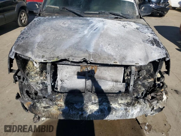 2004 GMC Envoy SLT z VIN 1GKET16S546133758, wystawiony jako Copart lot #76717674 z przebiegiem Nie podano mil oraz Szkoda całkowita • Salvage title. Historia ofert i sprzedaży dostępna na DreamBid. Obrazek 11.
