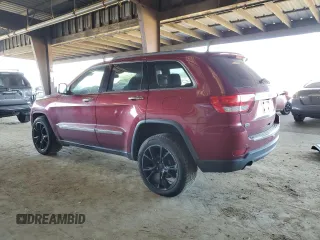 2013 Jeep Grand Cherokee Overland with VIN 1C4RJECT6DC526743, listed as a Copart auction lot 50203065 with 186,673 mi miles and Salvage Title. Bid and sale history available at DreamBid. Image 2.