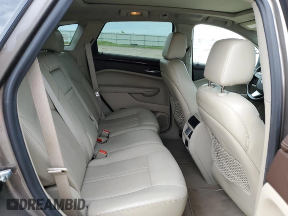 2011 Cadillac SRX Luxury Collection z VIN 3GYFNAEY8BS619208, wystawiony jako Copart lot #58321585 z przebiegiem 176 560 mil mil oraz Nie do naprawy • Non repairable. Historia ofert i sprzedaży dostępna na DreamBid. Obrazek 10.