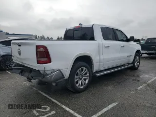 2020 Ram 1500 with VIN 1C6RREKG4LN401571, listed as a Copart auction lot 43620245 with 99,979 mi miles and Salvage title. Bid and sale history available at DreamBid. Image 3.