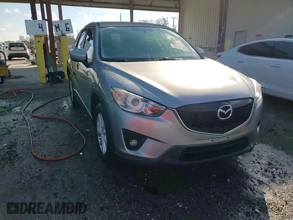 2014 Mazda CX-5 Touring with VIN JM3KE2CY8E0305641, listed as a Copart auction lot 42617165 with 107,336 mi miles and Salvage Title. Bid and sale history available at carsss.com. Image 14.