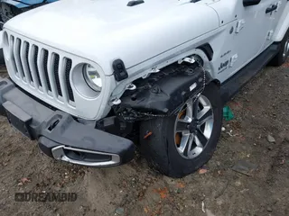 2021 Jeep Wrangler Unlimited Sahara with VIN 1C4HJXEG6MW751752, listed as a IAAI auction lot 41104960 with 47,460 mi miles and . Bid and sale history available at DreamBid. Image 6.