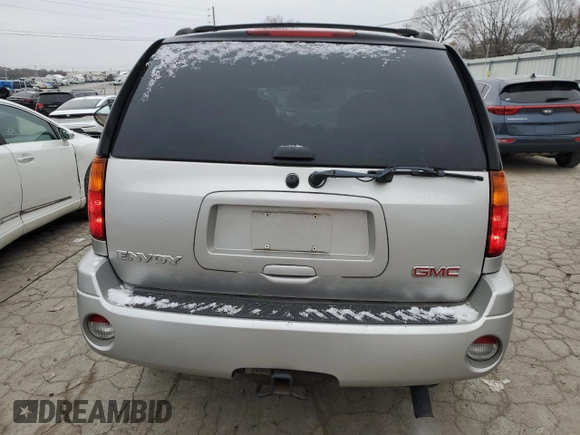 2005 GMC Envoy SLT with VIN 1GKDS13S452258553, listed as a Copart auction lot 82888944 with 174,546 mi miles and Salvage Title. Bid and sale history available at carsss.com. Image 6.