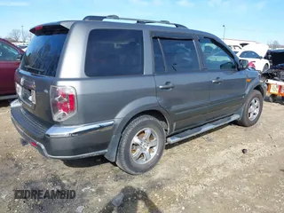2007 Honda Pilot EX-L with VIN 5FNYF28737B001928, listed as a IAAI auction lot 41311134 with 243,870 mi miles. Bid and sale history available at carsss.com. Image 4.
