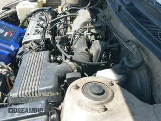 1996 Toyota Corolla DX with VIN 1NXBB02E2TZ491711, listed as a IAAI auction lot 43258581 with 212,611 mi miles and . Bid and sale history available at DreamBid. Image 12.