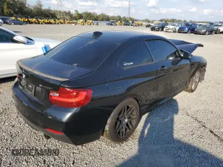 2015 BMW 2 Series M235i with VIN WBA1J7C56FV358181, listed as a Copart auction lot 89079445 with 0 mi miles and Salvage Title. Bid and sale history available at carsss.com. Image 4.