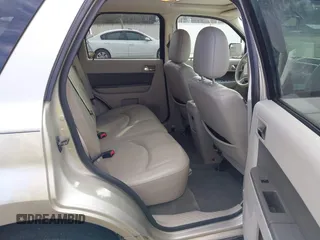 2010 Mercury Mariner Premier with VIN 4M2CN8HG4AKJ05736, listed as a IAAI auction lot 41744987 with 209,819 mi miles and . Bid and sale history available at DreamBid. Image 8.