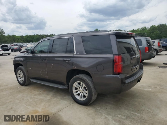 2015 Chevrolet Tahoe LS with VIN 1GNSCAKC8FR243239, listed as a Copart auction lot 53604445 with 155,881 mi miles and Salvage title. Bid and sale history available at DreamBid. Image 2.