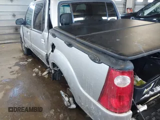 2004 Ford Explorer Sport Trac XLS z VIN 1FMZU77K84UB99207, wystawiony jako IAAI lot #41621860 z przebiegiem 126 634 mil mil oraz . Historia ofert i sprzedaży dostępna na DreamBid. Obrazek 6.