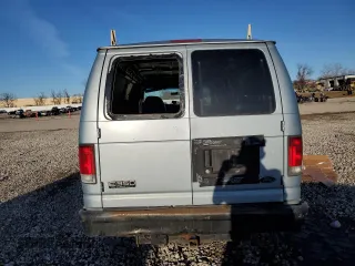 2000 Ford Econoline Passenger XL with VIN 1FBSS31S0YHB66699, listed as a Copart auction lot 46336245 with 189,130 mi miles and Salvage Title. Bid and sale history available at DreamBid. Image 6.