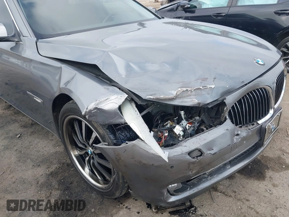 2012 BMW 7 Series 740i with VIN WBAKA4C52CC613676, listed as a IAAI auction lot 42509312 with 113,971 mi miles and . Bid and sale history available at DreamBid. Image 6.