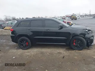 2018 Jeep Grand Cherokee SRT z VIN 1C4RJFDJ2JC391503, wystawiony jako IAAI lot #41717243 z przebiegiem 78 157 mil mil oraz . Historia ofert i sprzedaży dostępna na DreamBid. Obrazek 13.