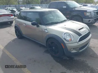 2009 MINI Hardtop S with VIN WMWMF73569TW87929, listed as a IAAI auction lot 42057214 with 164,922 mi miles and . Bid and sale history available at DreamBid. Image 1.