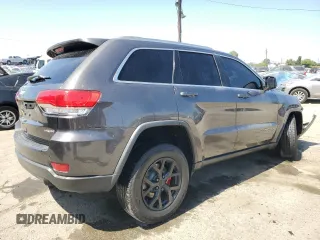 2018 Jeep Grand Cherokee Laredo E with VIN 1C4RJEAG9JC397382, listed as a Copart auction lot 56550815 with 72,239 mi miles and Salvage title. Bid and sale history available at DreamBid. Image 3.