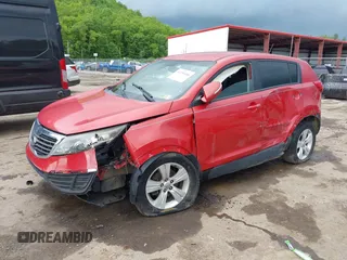 2012 Kia Sportage LX with VIN KNDPB3A23C7311640, listed as a IAAI auction lot 42258206 with 220,000 mi miles and . Bid and sale history available at DreamBid. Image 2.