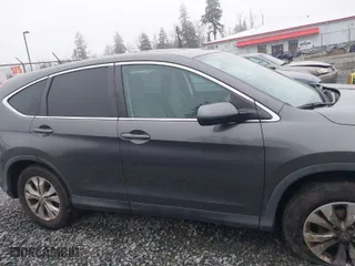 2013 Honda CR-V EX with VIN 2HKRM4H50DH674385, listed as a IAAI auction lot 41341638 with 165,257 mi miles. Bid and sale history available at carsss.com. Image 13.