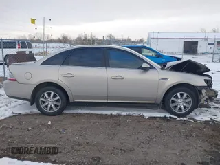 2009 Ford Taurus SEL with VIN 1FAHP27W89G121776, listed as a IAAI auction lot 40854998 with 150,022 mi miles. Bid and sale history available at carsss.com. Image 14.