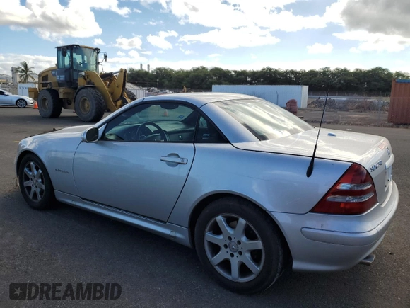 2002 Mercedes-Benz SLK-Class 2.3L Kompressor with VIN WDBKK49FX2F242987, listed as a Copart auction lot 65685554 with 96,461 mi miles and Salvage Title. Bid and sale history available at carsss.com. Image 2.