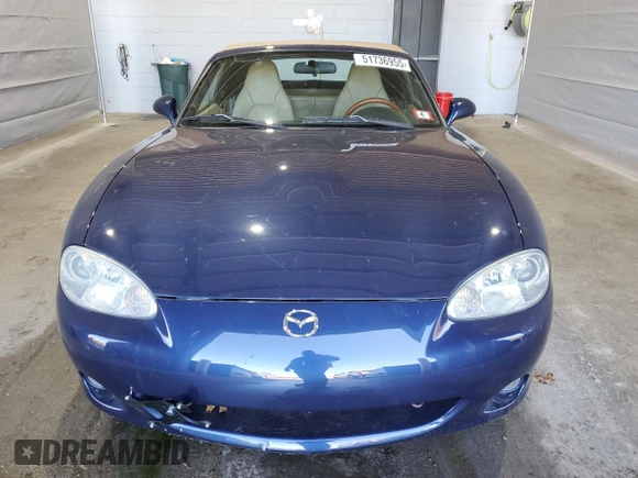 2001 Mazda MX-5 Miata with VIN JM1NB353510209224, listed as a Copart auction lot 51736955 with 103,732 mi miles and Salvage Title. Bid and sale history available at DreamBid. Image 5.