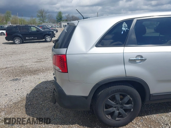 2013 Kia Sorento LX with VIN 5XYKTCA60DG372961, listed as a IAAI auction lot 42061693 with 181,034 mi miles. Bid and sale history available at carsss.com. Image 20.