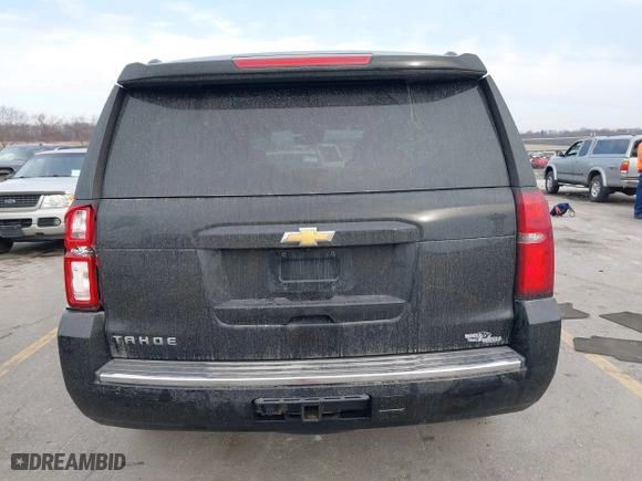 2016 Chevrolet Tahoe LTZ with VIN 1GNSKCKC9GR217166, listed as a IAAI auction lot 41152096 with 133,589 mi miles. Bid and sale history available at carsss.com. Image 16.