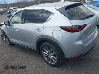 2021 Mazda CX-5 Grand Touring with VIN JM3KFBDM3M0354348, listed as a IAAI auction lot 41924207 with 45,786 mi miles. Bid and sale history available at carsss.com. Image 3.