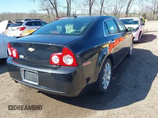 2011 Chevrolet Malibu LTZ with VIN 1G1ZE5E18BF143021, listed as a IAAI auction lot 41802508 with 148,866 mi miles and . Bid and sale history available at DreamBid. Image 4.