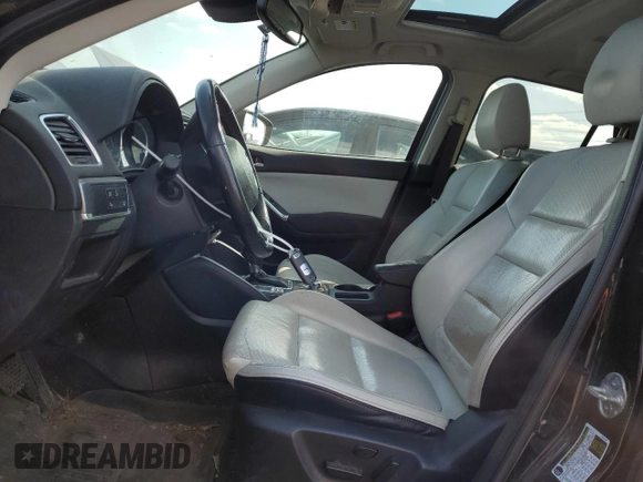 2016 Mazda CX-5 Grand Touring with VIN JM3KE4DY8G0719113, listed as a Copart auction lot 52160285 with 259,365 mi miles and Salvage Title. Bid and sale history available at carsss.com. Image 7.