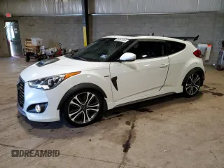 2016 Hyundai Veloster Turbo z VIN KMHTC6AEXGU279229, wystawiony jako Copart lot #56861945 z przebiegiem 72 768 mil mil oraz Szkoda całkowita • Salvage title. Historia ofert i sprzedaży dostępna na DreamBid. Obrazek 1.
