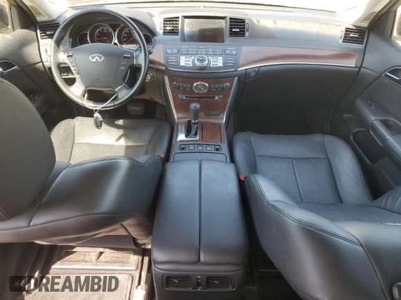 2008 Infiniti M с VIN JNKAY01FX8M650215, выставлен на аукционе Copart как лот 61283625 с пробегом 105 562 миль миль и Списание • Salvage title. История ставок и продаж доступна на DreamBid. Изображение 8.