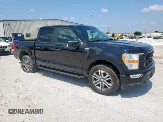2021 Ford F-150 XL with VIN 1FTEW1EP9MFB94496, listed as a Copart auction lot 59283315 with 30,753 mi miles and Salvage title. Bid and sale history available at DreamBid. Image 4.