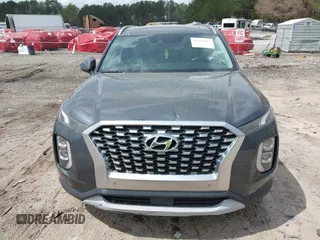 2020 Hyundai Palisade SEL z VIN KM8R34HE7LU100448, wystawiony jako IAAI lot #41952863 z przebiegiem 68 798 mil mil oraz . Historia ofert i sprzedaży dostępna na DreamBid. Obrazek 12.